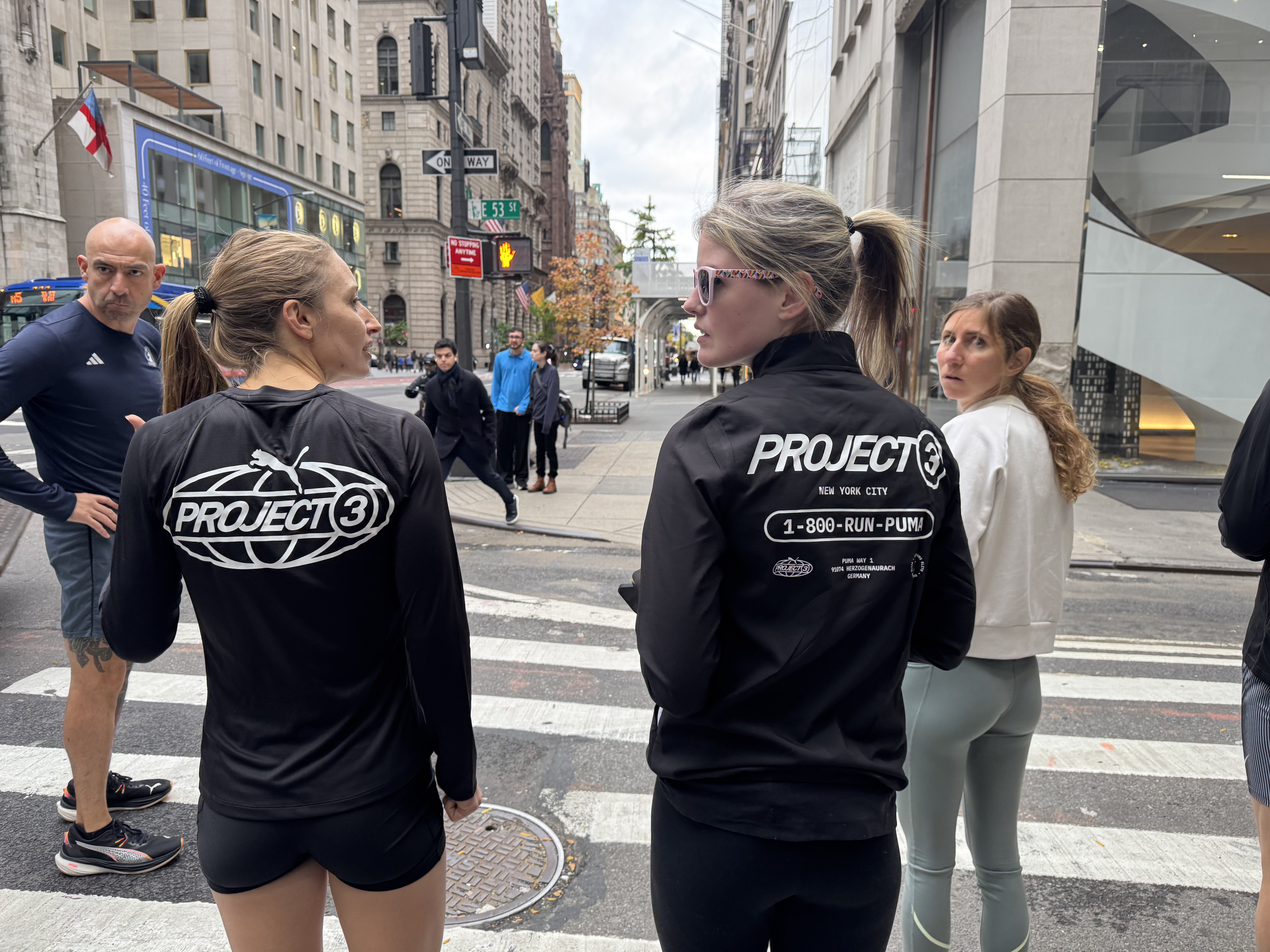Runners heading out on a shakeout run on 5th Avenue with Puma Project 3